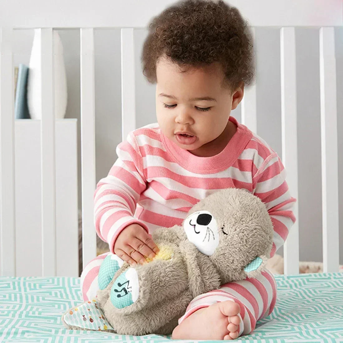 Sensory plush toy with breathing movements and sound